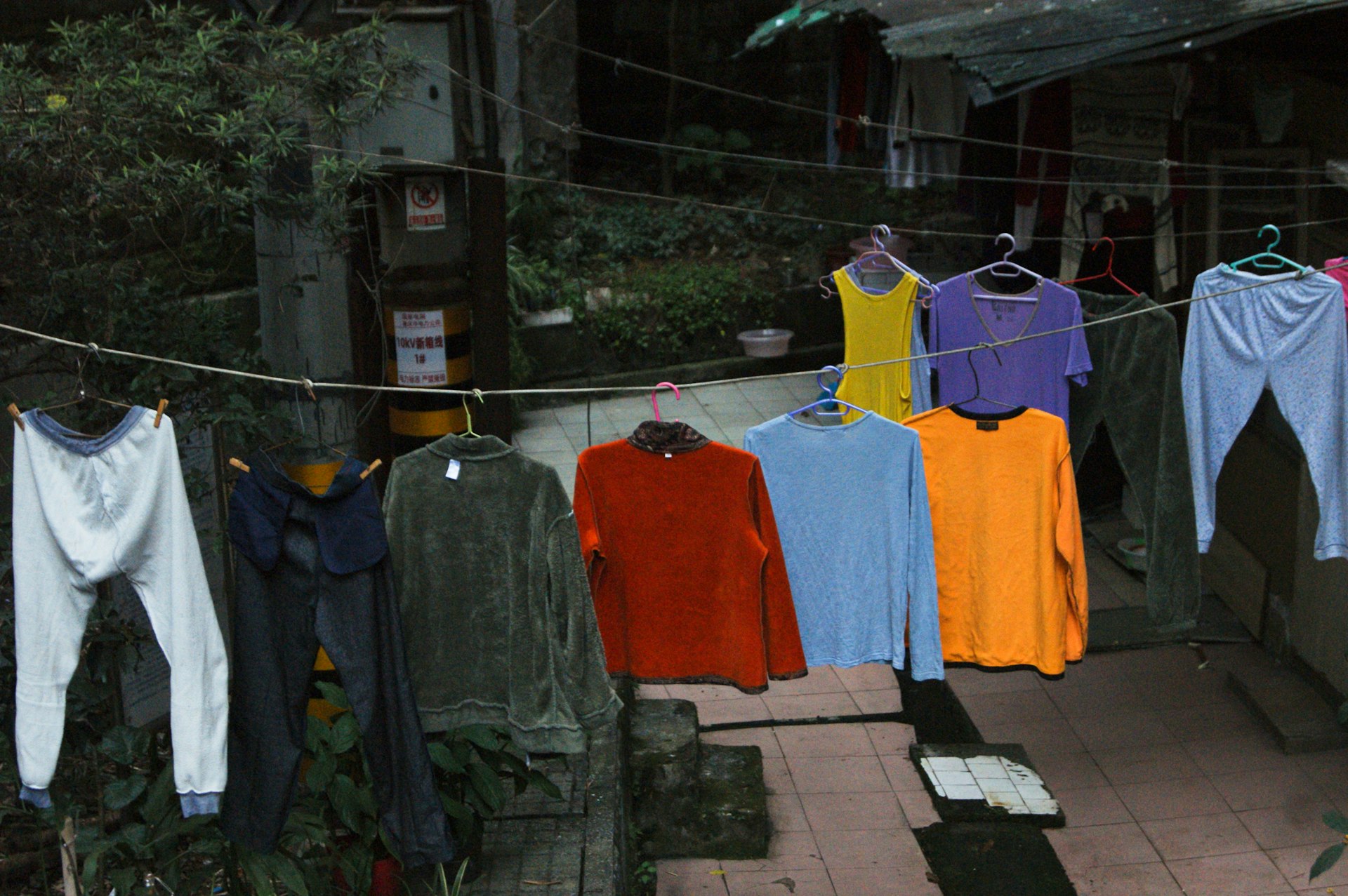 a line of clothes hanging on a clothes line